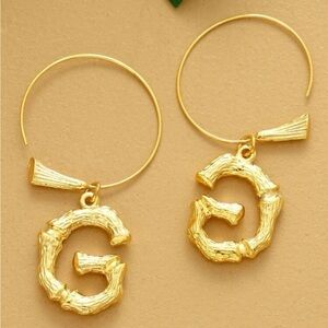 18k gold tone letter G gold tone earrings ✨